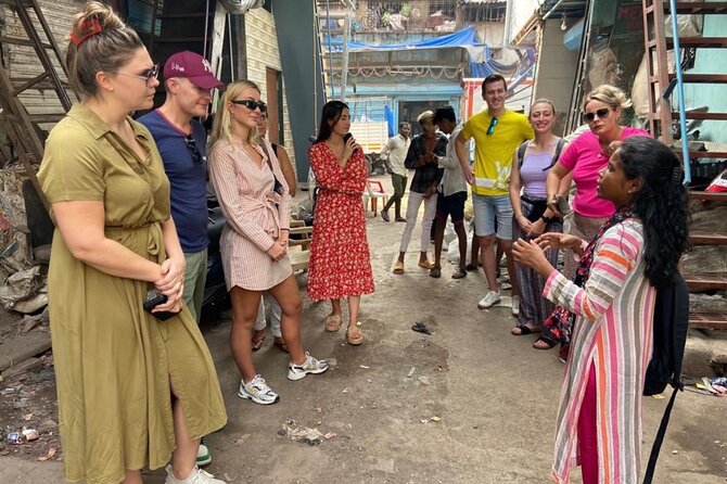 Best of Dharavi Slum with Market Tour - Entering Dhobi Ghat: Mumbai’s open-air laundry for hotels and hospitals