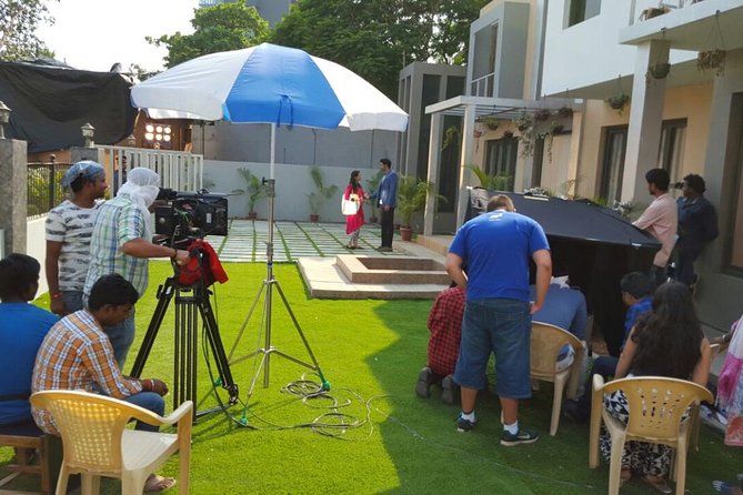 Bollywood Studio Tour experience - Bollywood set tour: temples, terraces, and filming action