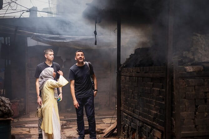 Inside Dharavi: A Unique Slum Tour with an Local Guide - Pickup, mobile tickets, and private-group basics
