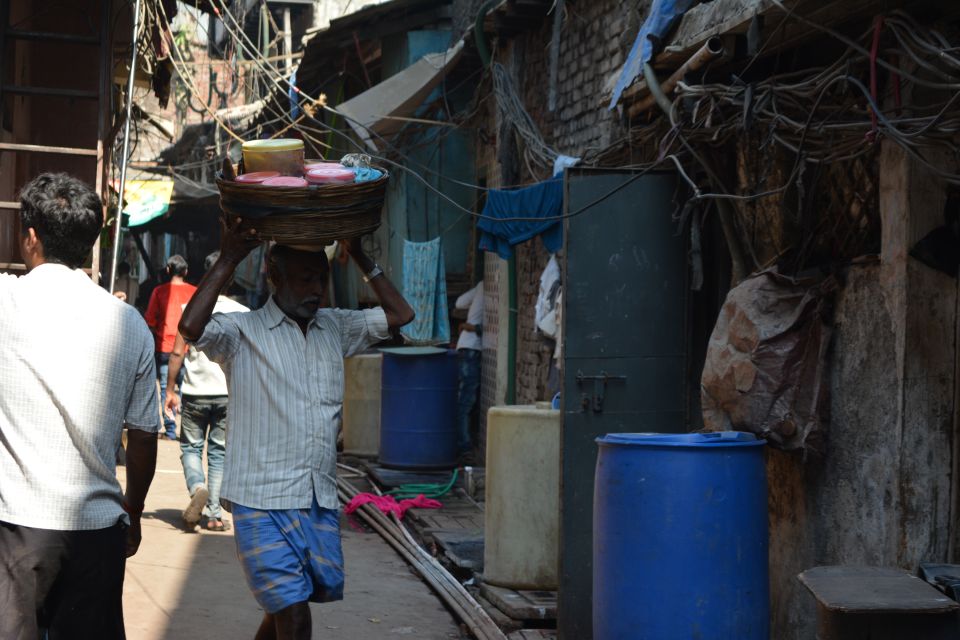 Mumbai: Dharavi Slum Tour with Dhobi Ghat (Open-Air Laundry) - Dhobi Ghat viewing deck: watching Mumbai’s open-air laundry at scale