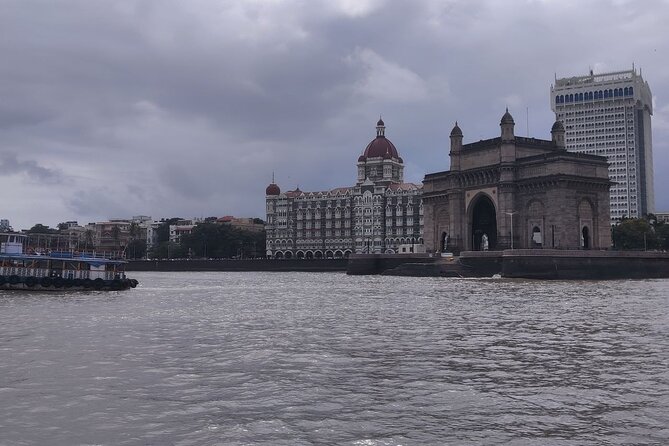 Mumbai Full-Day Sightseeing & Elephanta Caves Tour - CSMT, High Court, and Oval Maidan: historic power and everyday sport