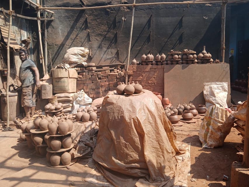 Mumbai Slum Tour - Visit Dharavi Slum with Local Guide - Leather, garments, and pottery: watching trades that keep moving