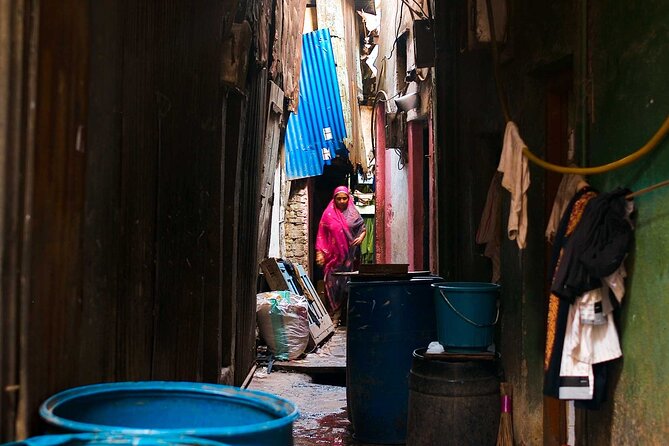 Private Dharavi Slum and Sightseeing Tour - Dhobi Ghat: The Outdoor Laundry Rhythm